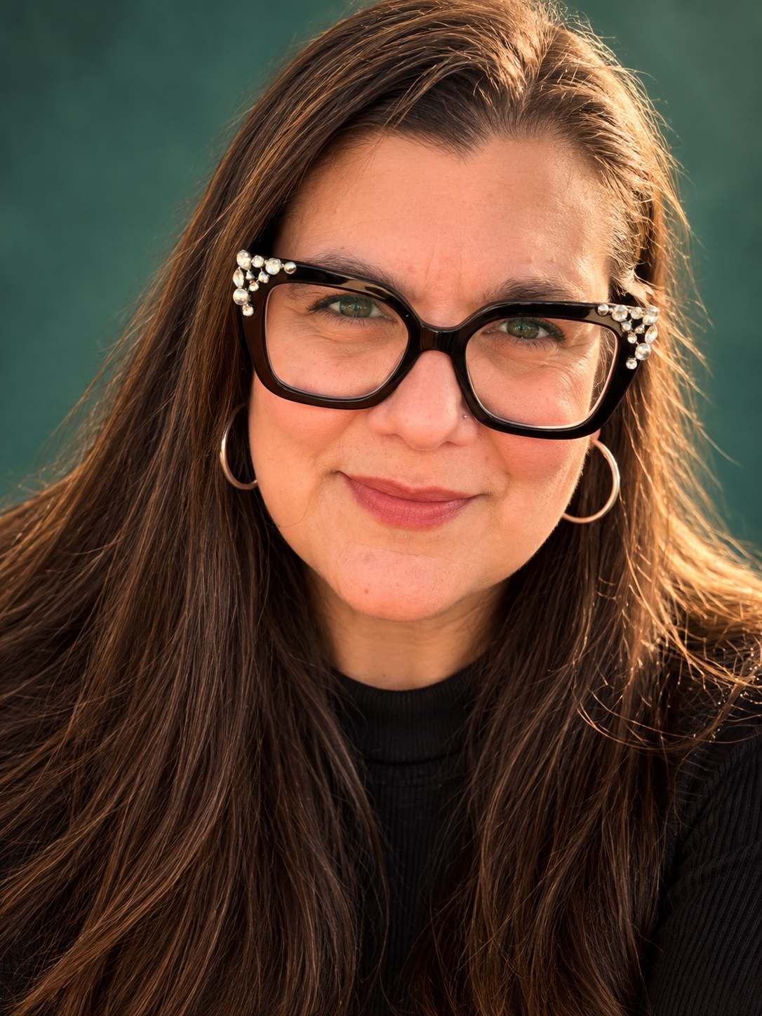 Jessica A. Leveto wearing embellished black glasses